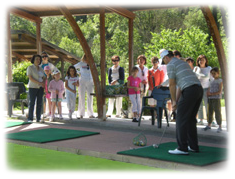 d�monstration pendant une initiation au golf